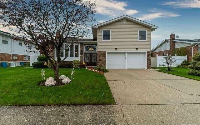 39 Barry Dr, Westbury, NY 11590
